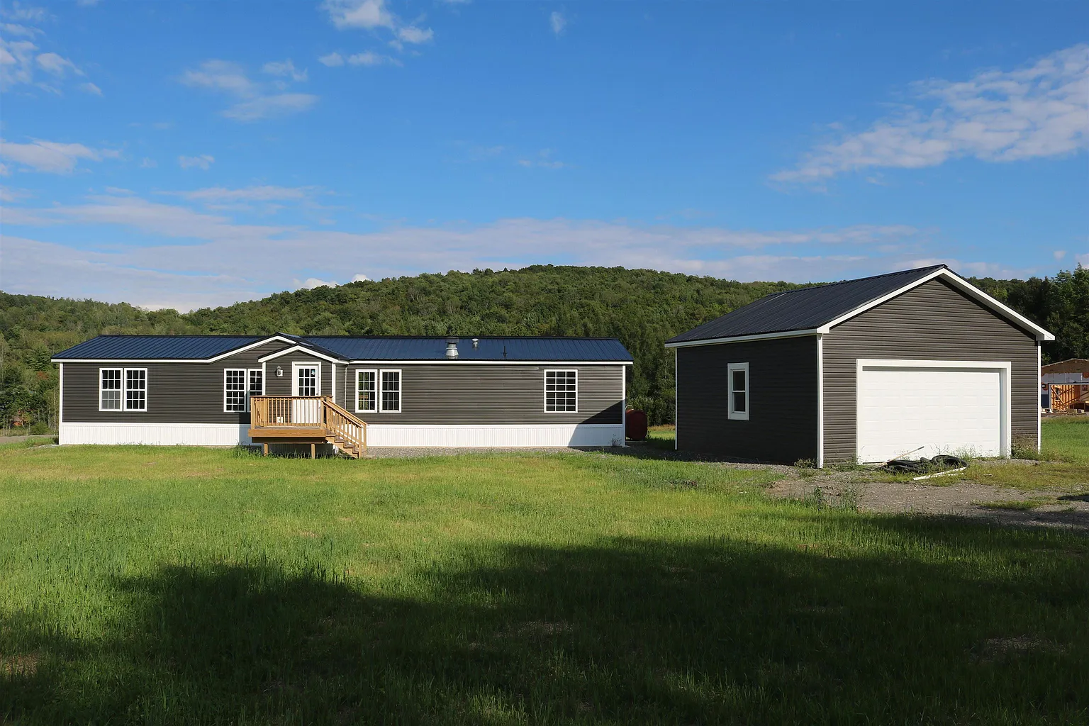 Home and detached garage on the property