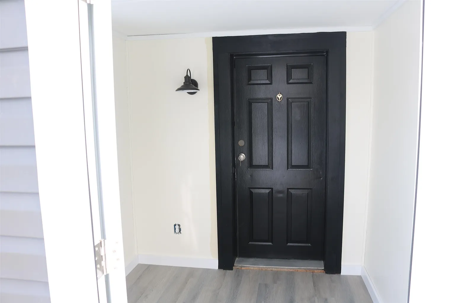 Front entry with black door